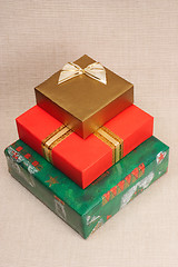 Image showing Pile of three gift boxes