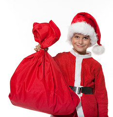 Image showing Boy holding a sack