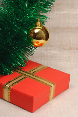 Image showing Gift box, ball and tinsel