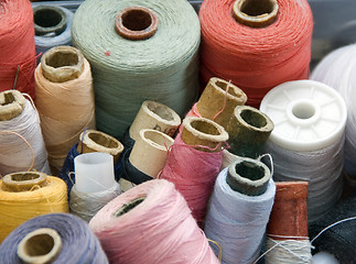 Image showing Many different reels of thread for sew 