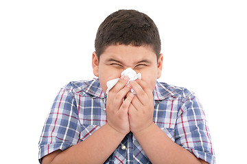 Image showing A young boy with a cold 