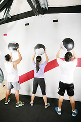 Image showing Man and Woman Doing Crossfit on gym. Crossfit Series 