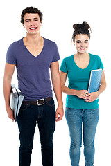 Image showing Fashionable college going students posing