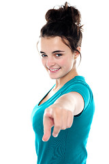 Image showing Fashionable trendy girl pointing towards camera