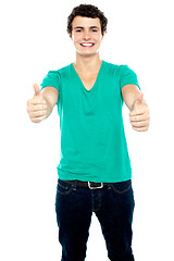 Image showing Guy showing thumbs up, arms stretched out