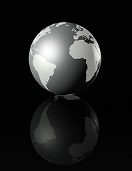 Image showing silver glossy globe on black background