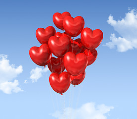 Image showing red heart shaped balloons floating in the sky