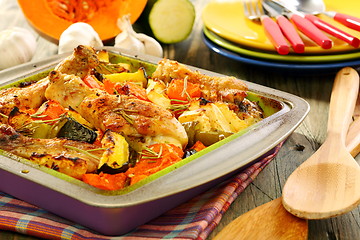 Image showing Chicken baked with pumpkin, zucchini, celery and rosemary.