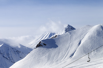 Image showing Snow slope and ropeway