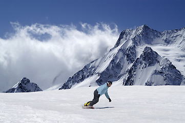 Image showing Snowboarder at ski resort