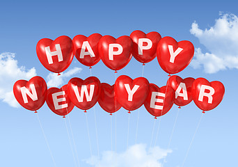 Image showing happy new year heart shaped balloons