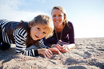 Image showing Mother and son at beach.