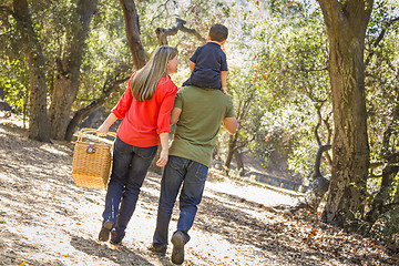 Image showing Mixed Race Family Enjoy a Walk in the Park