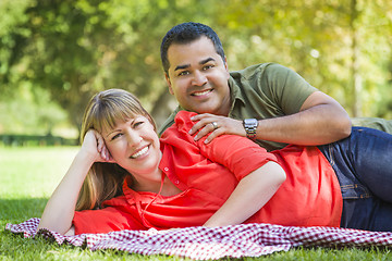 Image showing Attractive Mixed Race Couple Portrait at the Park