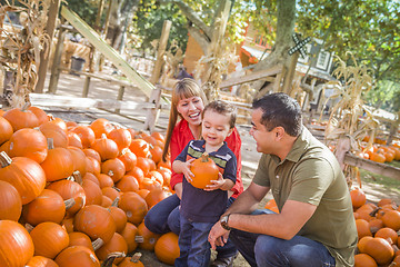 Image showing Happy Mixed Race Family at the Pumpkin Patch