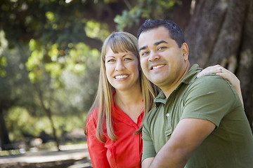 Image showing Attractive Mixed Race Couple Portrait at the Park