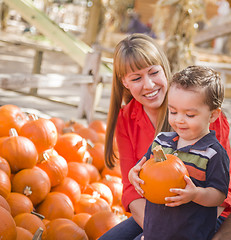 Image showing Happy Mixed Race Family at the Pumpkin Patch