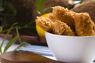 Image showing Golden chicken with coconut