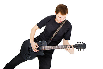 Image showing Musician with a black electric guitar