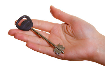 Image showing Woman's hand with key on palm