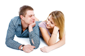 Image showing smiling girl and boy looking at each other