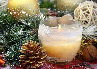 Image showing Christmas decorations and candle