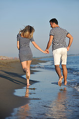 Image showing happy young couple have romantic time on beach