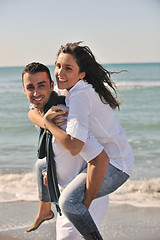 Image showing happy young couple have fun at beautiful beach