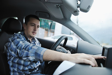 Image showing man using car navigation