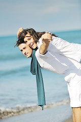 Image showing happy young couple have fun at beautiful beach