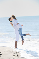 Image showing happy young couple have fun at beautiful beach