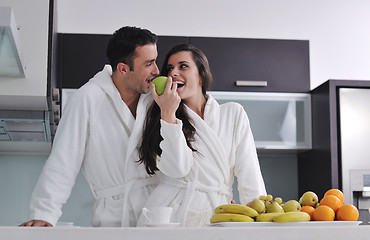 Image showing young couple have fun in modern kitchen