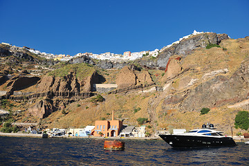 Image showing santorini island coast with luxury yacht