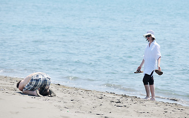 Image showing happy young couple have fun on beach