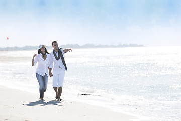 Image showing happy young couple have fun at beautiful beach