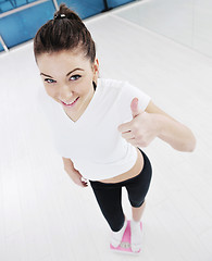 Image showing happy diet concept with young woman on pink scale