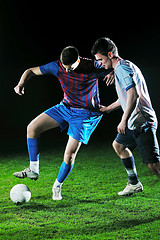 Image showing football players in competition for the ball