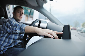 Image showing man using car navigation