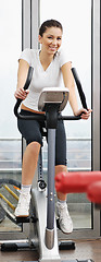 Image showing woman workout  in fitness club on running track 