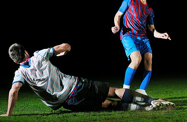 Image showing football players in competition for the ball