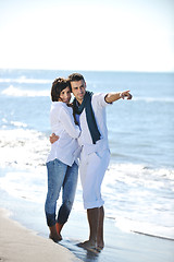 Image showing happy young couple have fun at beautiful beach