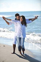 Image showing happy young couple have fun at beautiful beach