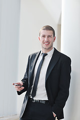 Image showing young business man talk by cellphone