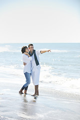 Image showing happy young couple have fun at beautiful beach