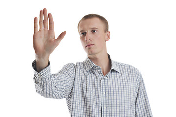 Image showing handsome young business man touching screen isolated