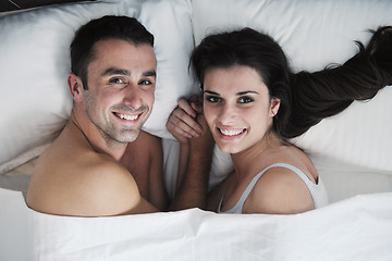 Image showing young couple have good time in their bedroom