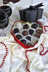 Image showing wine, chocolate and praline decoration 