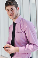 Image showing young business man talk by cellphone