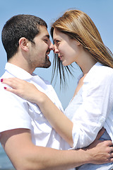 Image showing happy young couple have fun on beach