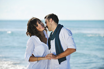 Image showing happy young couple have fun at beautiful beach